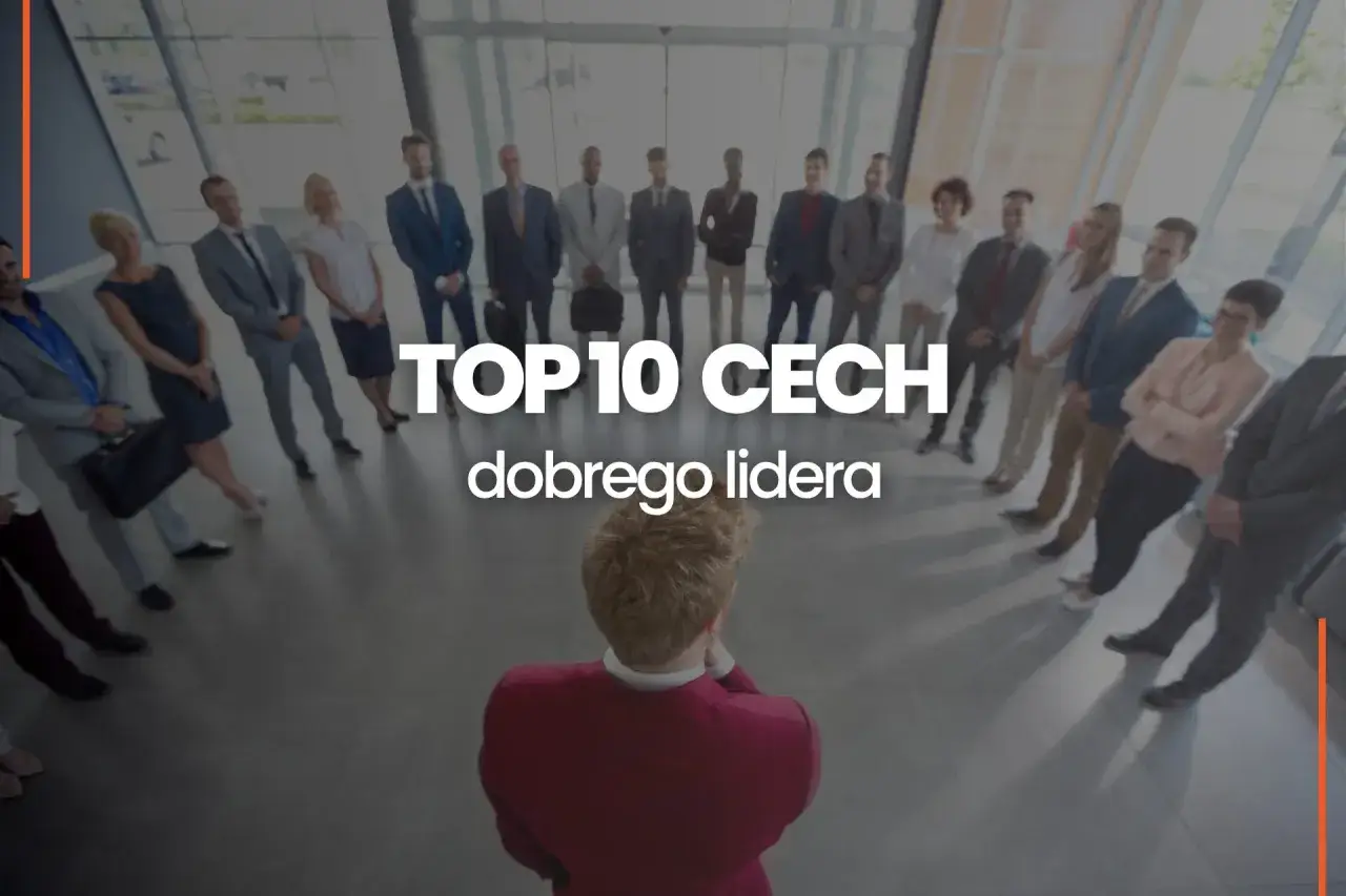 Grupa ludzi w garniturach stoi w kręgu, słuchając swojego lidera. Tekst